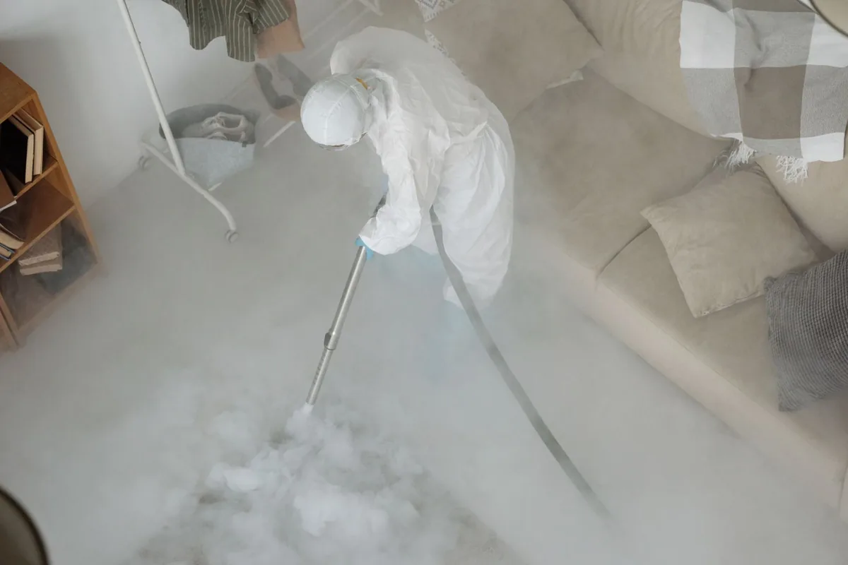 Biohazard cleanup technician in protective equipment, Pelham Parkway / Van Nest, New York, NY